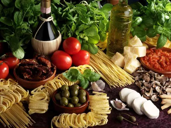 Fresh assorted Italian ingredients on a table.