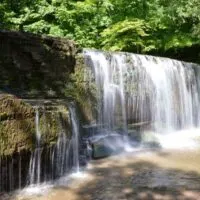 Waterfall over rock outcropping