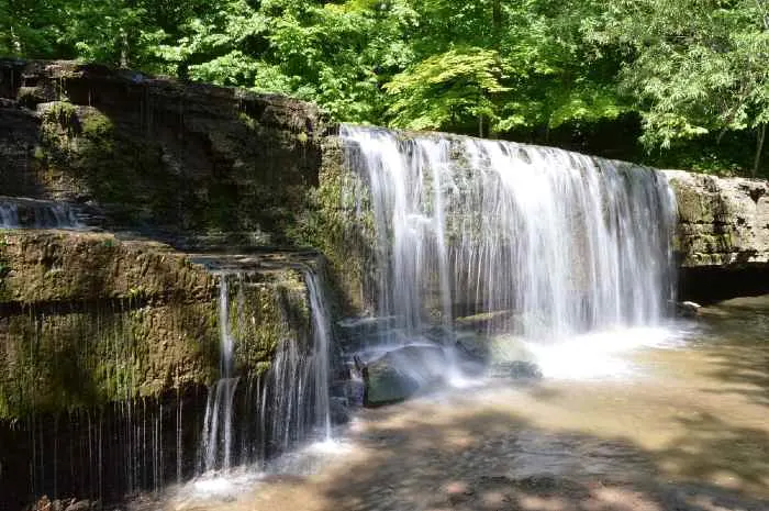 Waterfall over rock outcropping
