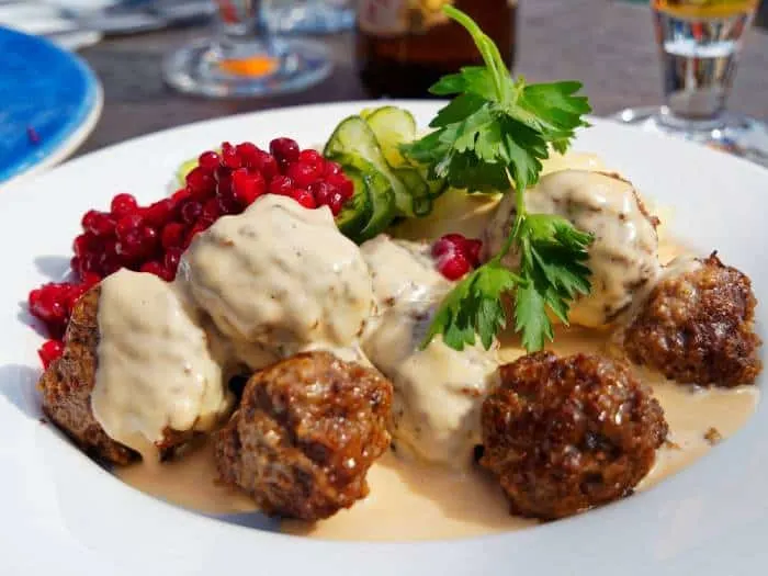 Meatballs and cream sauce with relish at one of the best places to eat in Minnesota. 