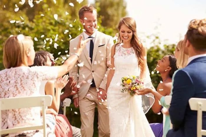A married couple and guests at a wedding venue in Minnesota.