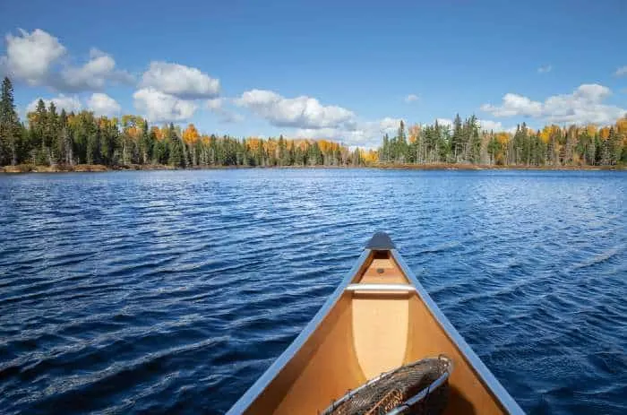 Canoe on a blue lake in northern Minnesota