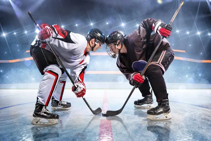 Hockey players facing off
