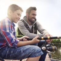 Man and boy fishing