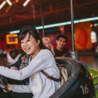 Girl driving bumper car