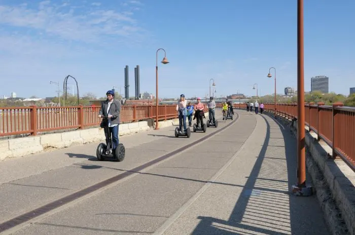 Visitors and residents ride rented Segways across the Stone
Arch Bridge in downtown Minneapolis