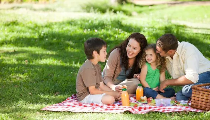 Family picnicking together at one of the great things to do in Golden Valley

