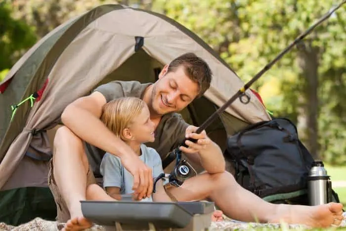 Teach your son to fish at one of the best places for tent camping in Minnesota