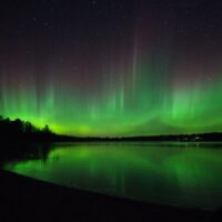 Northern lights over lake