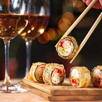 Sushi served with chopsticks