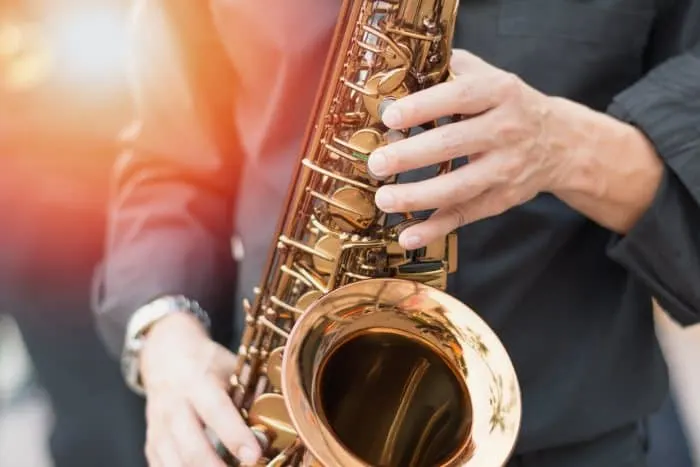Saxophone, music instrument played by saxophonist