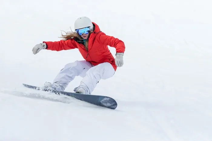 Woman snowboarder