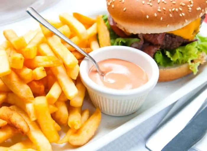Savor freshly cooked fries and unique toppings with your mouthwatering burger