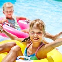 Girls on water tubes
