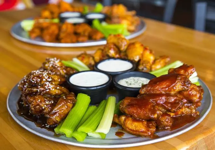Buffalo Chicken Hot Wings with Ranch Sauce and Celery Sticks; some of the best wings in Minnesota