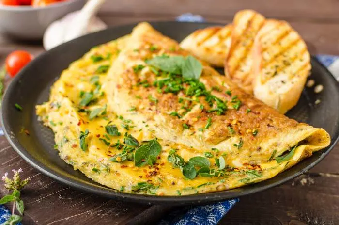 Herb omelette with chives and oregano from one of the best breakfast restaurants in Minneapolis