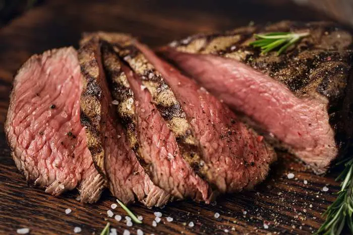 Savor a juicy medium Beef Rib Eye steak at one of the best steakhouses in Minneapolis