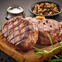 Grilled steaks with spices
