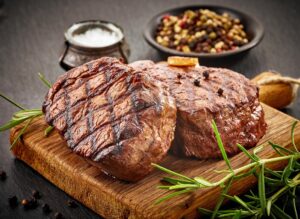 Grilled steaks with spices