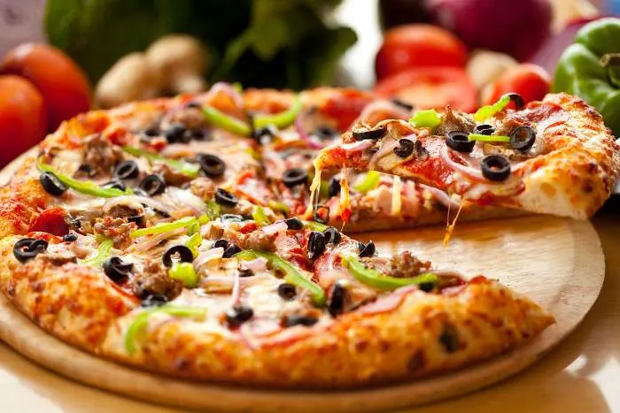 Supreme Pizza lifted slice