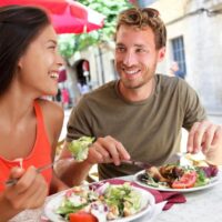 Couple dining outdoors
