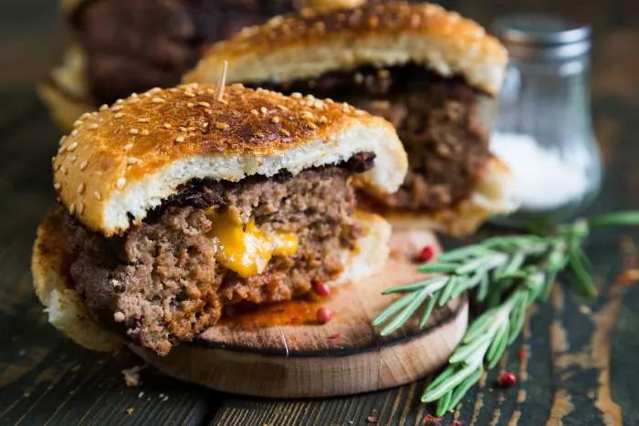 Big burger stuffed with cheese, one of the best burgers in Minneapolis