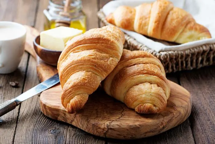 Delicious breakfast with fresh croissants