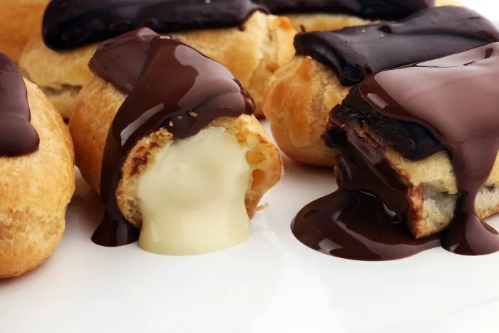 Traditional French dessert. Eclair with chocolate icing.