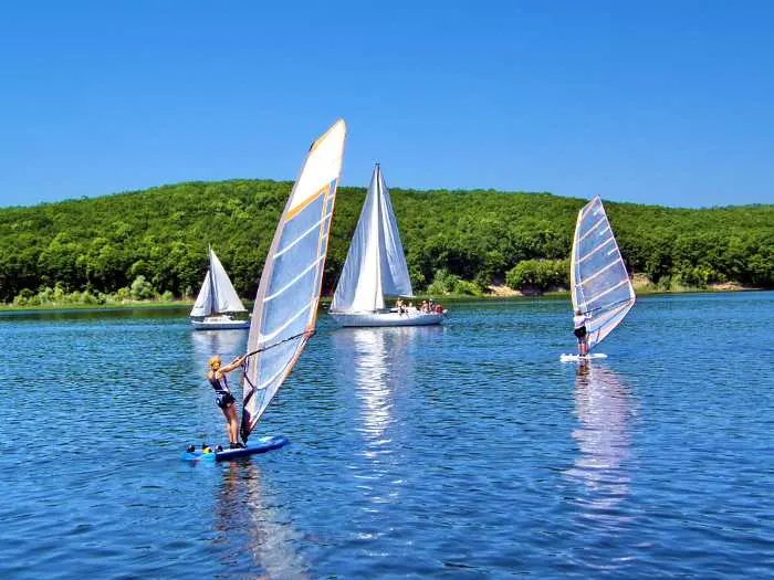 Windsurfing on a lake