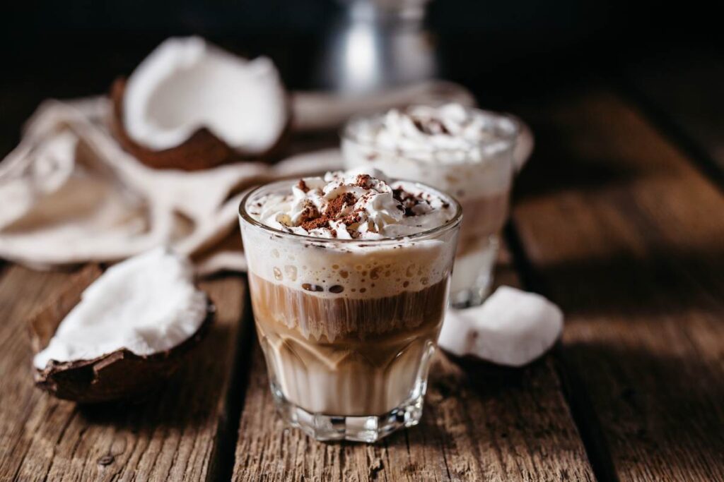 Coconut latte on a wooden table.
