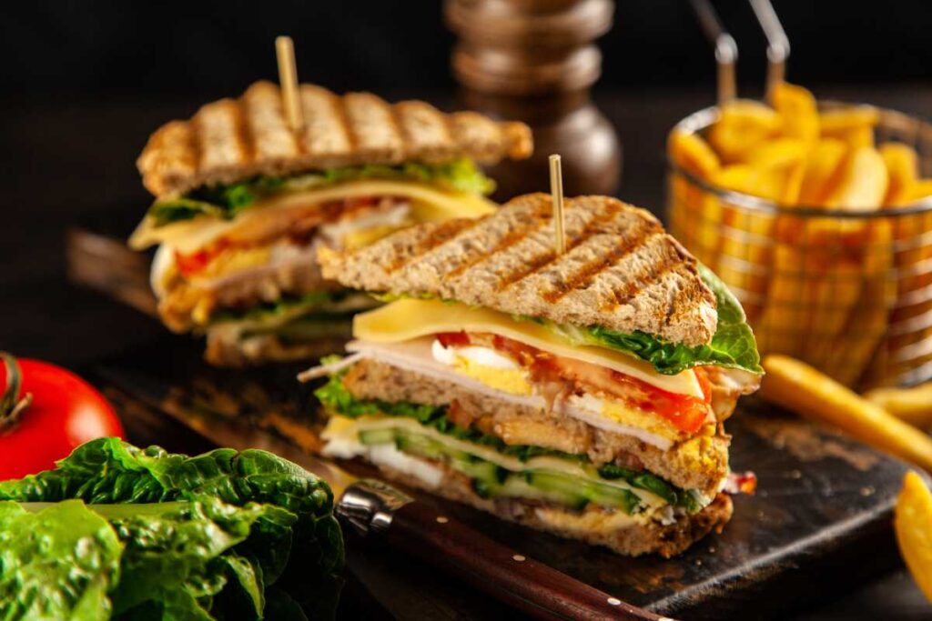Tall club sandwich and french fries from one of the spots for the best sandwiches Minneapolis offers