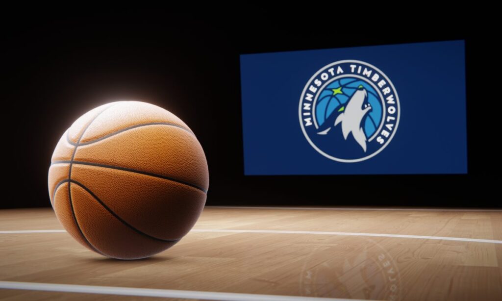 Basketball in foreground with logo of NBA team Minnesota Timberwolves