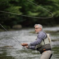 Man fly fishing in river