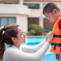 A child wearing the best life jacket for kids.