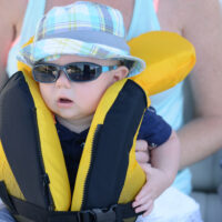 Baby perhaps wearing a best infant life jacket.