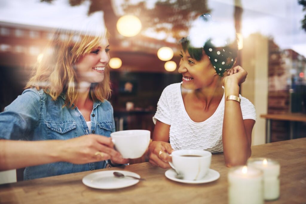 Friends chatting at a coffee shop.