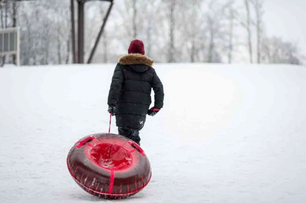 Dragging a Snowtube Uphill