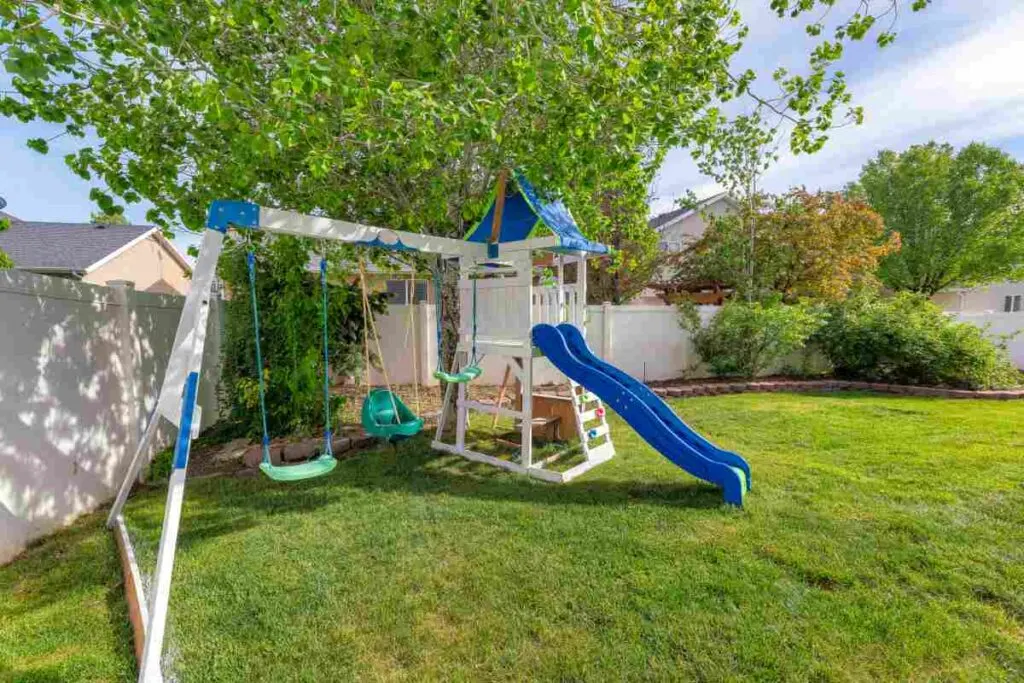 Big Minnesota Backyard with a playset.