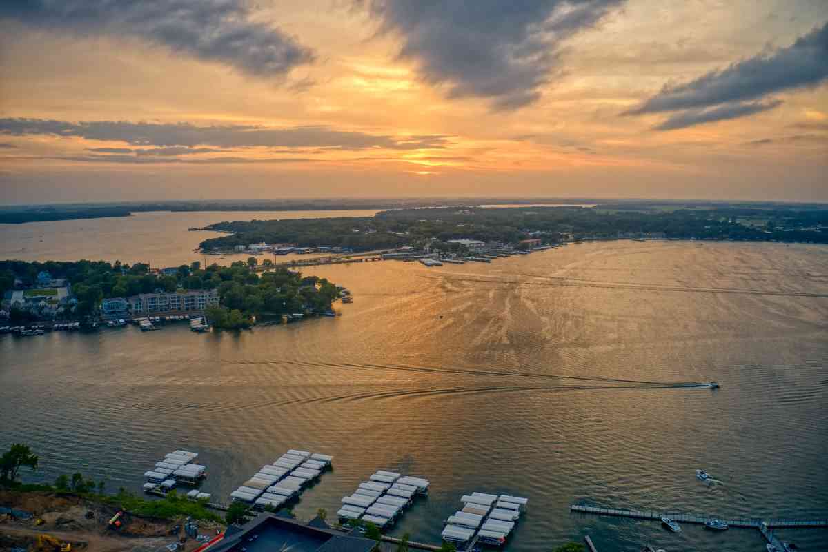 Aerial view of boats docked at lake showing things to do in Okoboji
