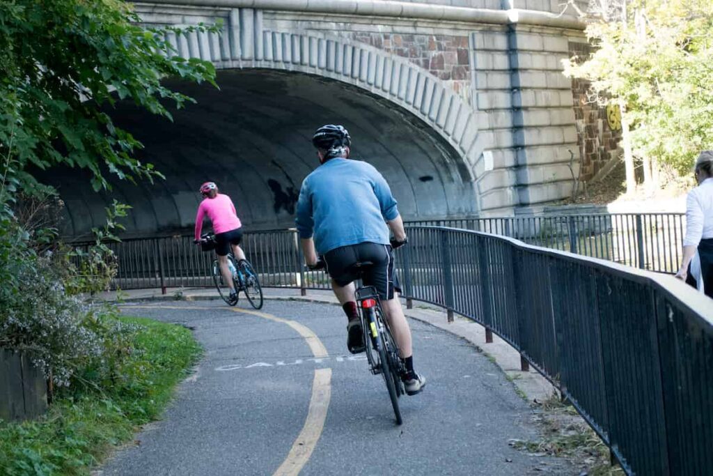 People riding on a bike trail in Minneapolis, MN.