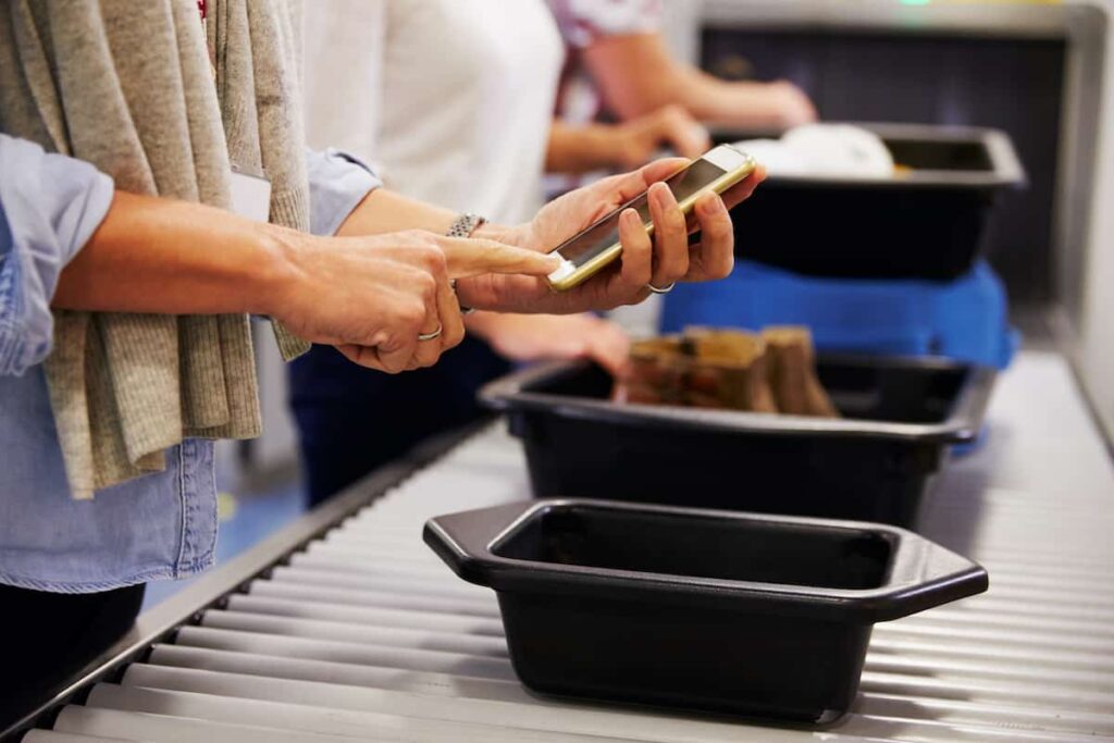 Preparing items to go through airport security screening.