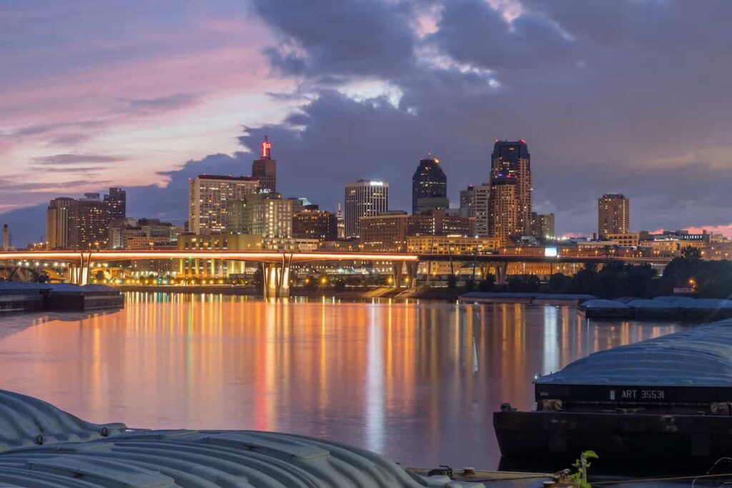 A view of the St. Paul skyline reflected in the river at night.