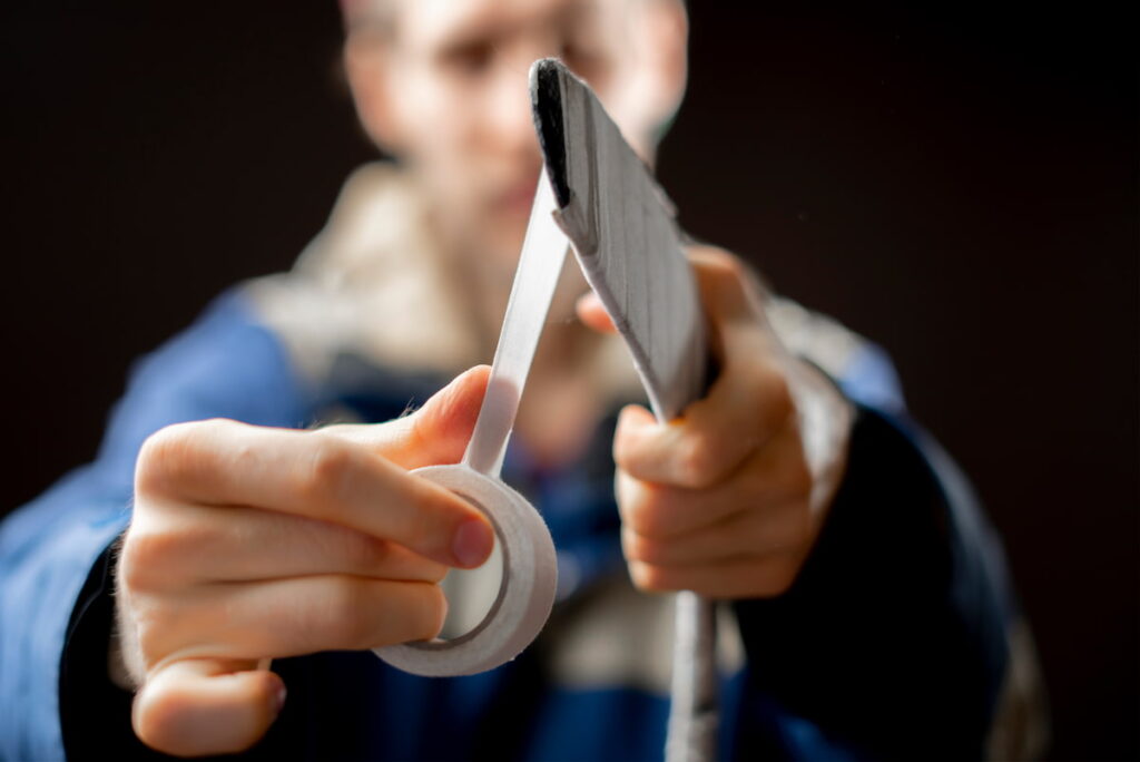 how to tape a hockey stick