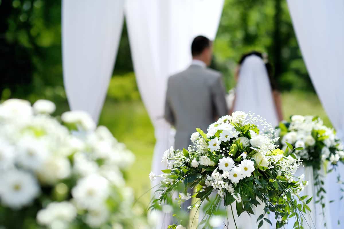 An outdoor wedding setting.